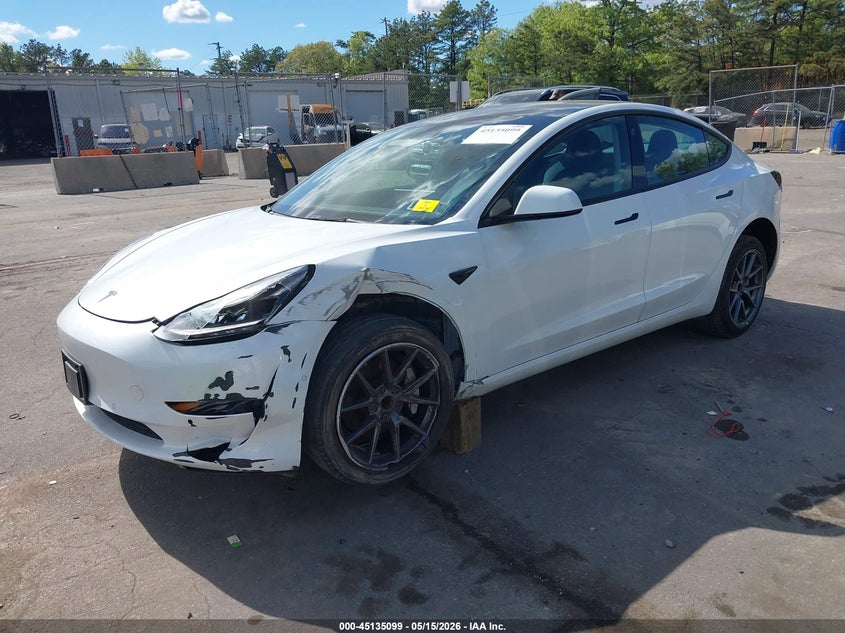 2022 Tesla Model 3 VIN 5YJ3E1EA0NF112697 IAAI salvage auction — LEFT FRONT, Mv-907A (New York), sold $6,650 on 2026-07-14 (photo 2)