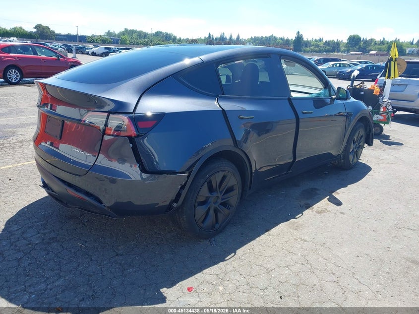 2025 Tesla Model y VIN 7SAYGDEE2SA355525 IAAI salvage auction — FRONT & REAR, Salvage Title, sold $13,350 on 2026-07-23 (photo 4)