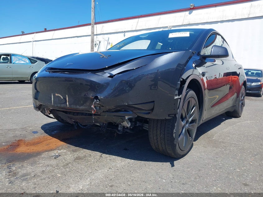 2025 Tesla Model y VIN 7SAYGDEE2SA355525 IAAI salvage auction — FRONT & REAR, Salvage Title, sold $13,350 on 2026-07-23 (photo 6)