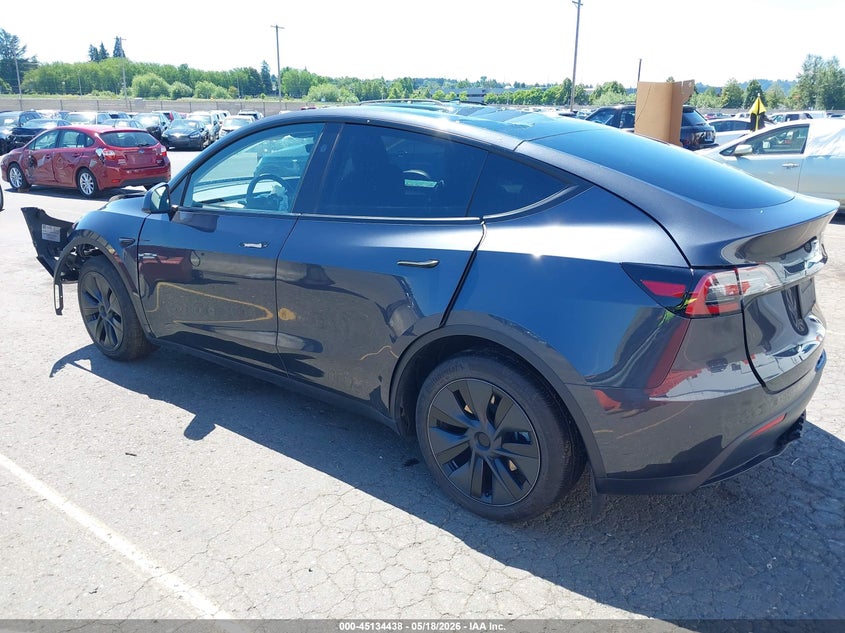 2025 Tesla Model y VIN 7SAYGDEE2SA355525 IAAI salvage auction — FRONT & REAR, Salvage Title, sold $13,350 on 2026-07-23 (photo 3)