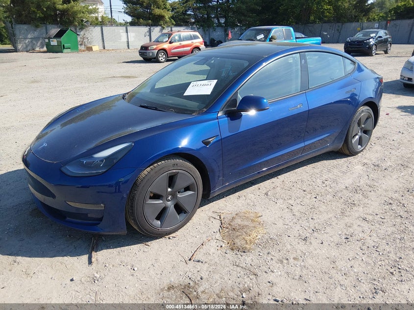 2022 Tesla Model 3 VIN 5YJ3E1EBXNF106074 IAAI salvage auction — RIGHT SIDE, Salvage (Idaho), sold $10,825 on 2026-07-07 (photo 2)
