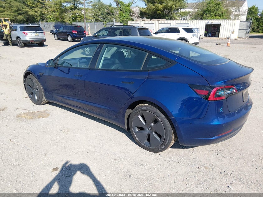 2022 Tesla Model 3 VIN 5YJ3E1EBXNF106074 IAAI salvage auction — RIGHT SIDE, Salvage (Idaho), sold $10,825 on 2026-07-07 (photo 3)