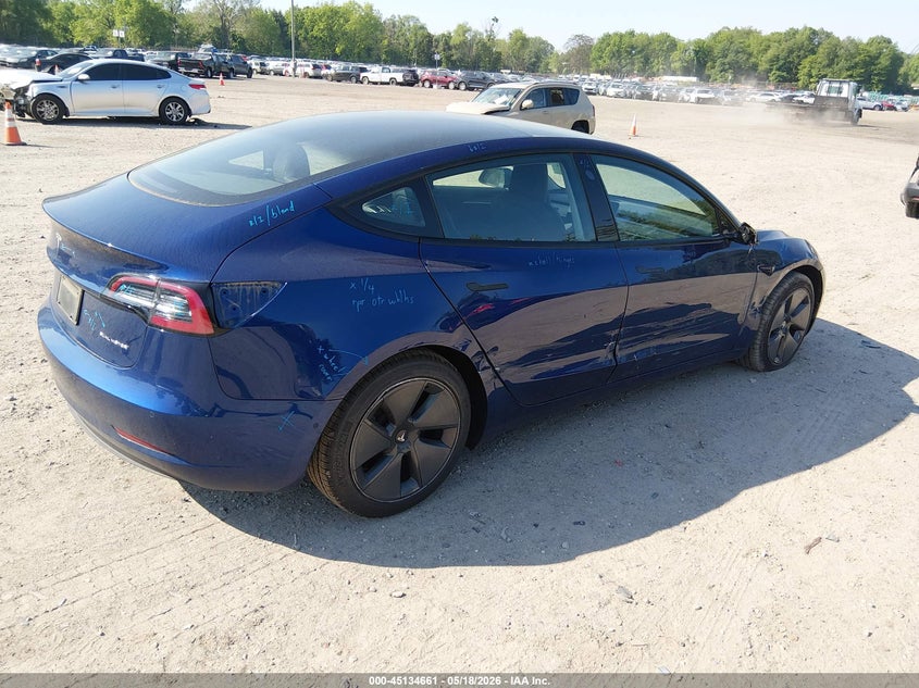 2022 Tesla Model 3 VIN 5YJ3E1EBXNF106074 IAAI salvage auction — RIGHT SIDE, Salvage (Idaho), sold $10,825 on 2026-07-07 (photo 4)