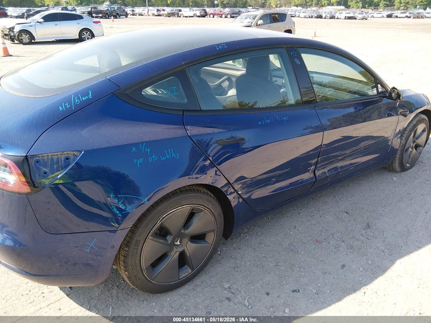 2022 Tesla Model 3 VIN 5YJ3E1EBXNF106074 IAAI salvage auction — RIGHT SIDE, Salvage (Idaho), sold $10,825 on 2026-07-07 (photo 6)
