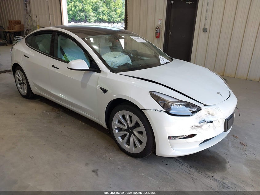 2023 Tesla Model 3 VIN 5YJ3E1EA5PF511494 — IAAI salvage auction photo