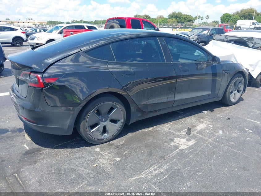 2023 Tesla Model 3 VIN 5YJ3E1EAXPF664078 IAAI salvage auction — REAR END, Certificate Of Destruction (Florida), sold $8,200 on 2026-07-09 (photo 4)