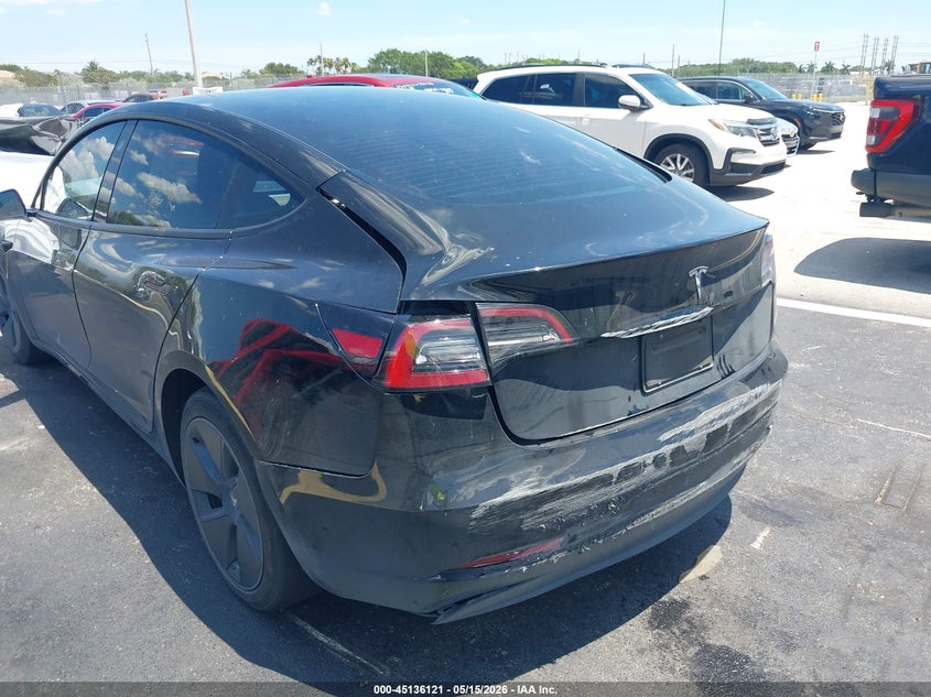2023 Tesla Model 3 VIN 5YJ3E1EAXPF664078 IAAI salvage auction — REAR END, Certificate Of Destruction (Florida), sold $8,200 on 2026-07-09 (photo 6)