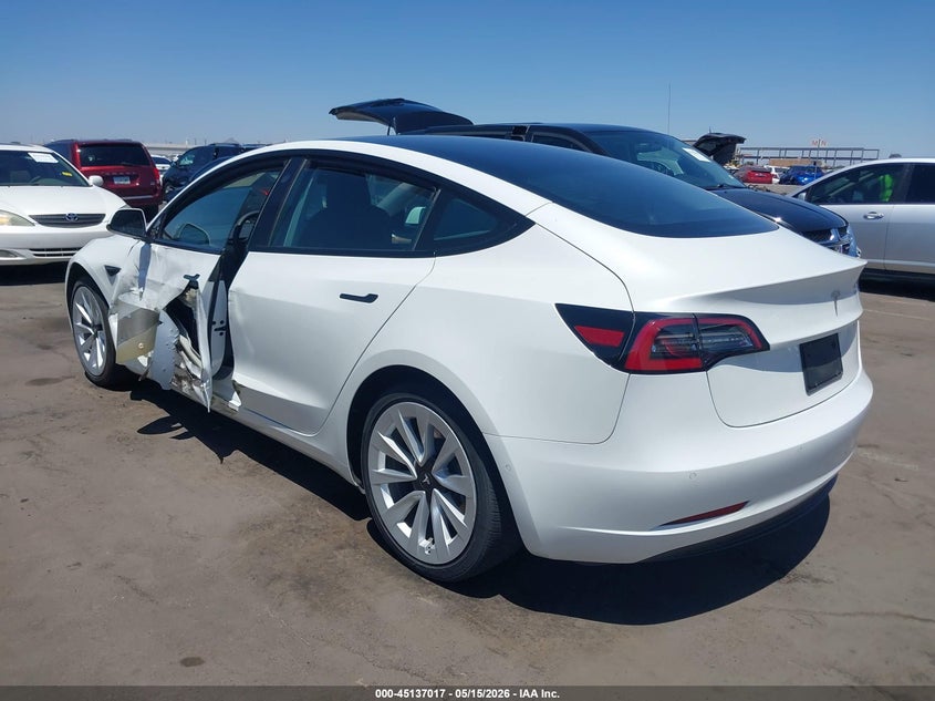 2021 Tesla Model 3 VIN 5YJ3E1EA0MF031925 IAAI salvage auction — SIDE, Salvage (Arizona), sold $5,500 on 2026-07-28 (photo 3)