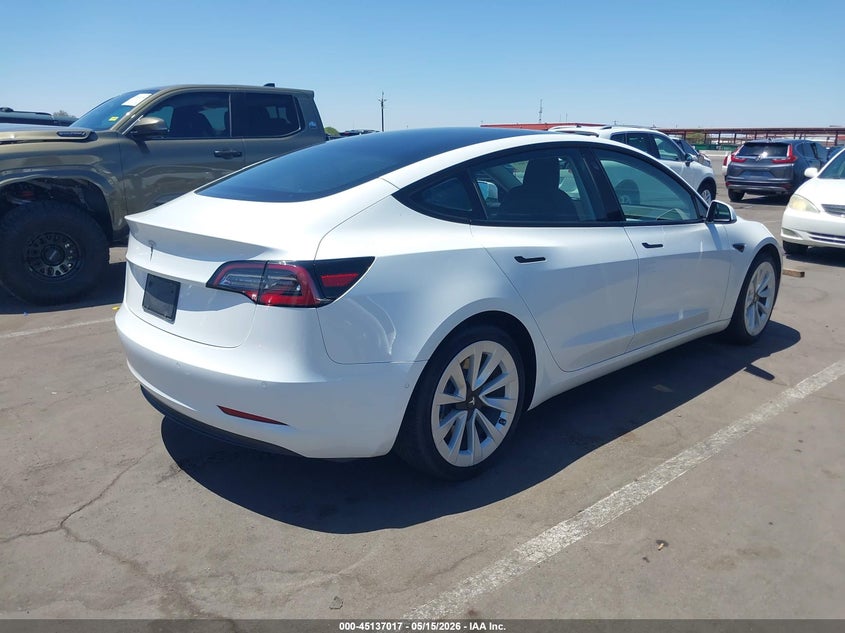 2021 Tesla Model 3 VIN 5YJ3E1EA0MF031925 IAAI salvage auction — SIDE, Salvage (Arizona), sold $5,500 on 2026-07-28 (photo 4)
