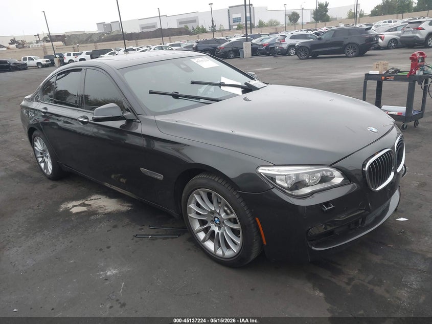 2015 BMW 7er VIN WBAYA8C57FGK19704 IAAI salvage auction — LEFT FRONT, Salvage Certificate (California), sold $1,700 on 2026-07-31 (photo 1)