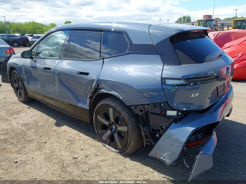 2024 BMW iX VIN WB523CF06RCP51667 IAAI salvage auction — Rear End, Salvage (Idaho), sold $26,750 on 2026-07-09 (photo 6)