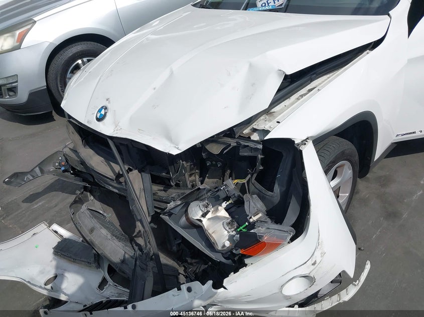 2015 BMW X1 VIN WBAVM1C56FV319161 IAAI salvage auction — FRONT END, Salvage Title, sold $1,250 on 2026-07-15 (photo 6)