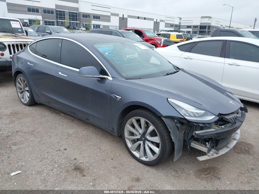 2020 Tesla Model 3 VIN 5YJ3E1EB9LF711975 IAAI salvage auction — LEFT SIDE, Salvage (Texas), sold $4,700 on 2026-07-16 (photo 1)