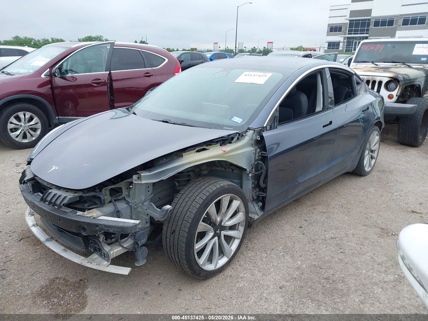2020 Tesla Model 3 VIN 5YJ3E1EB9LF711975 IAAI salvage auction — LEFT SIDE, Salvage (Texas), sold $4,700 on 2026-07-16 (photo 2)