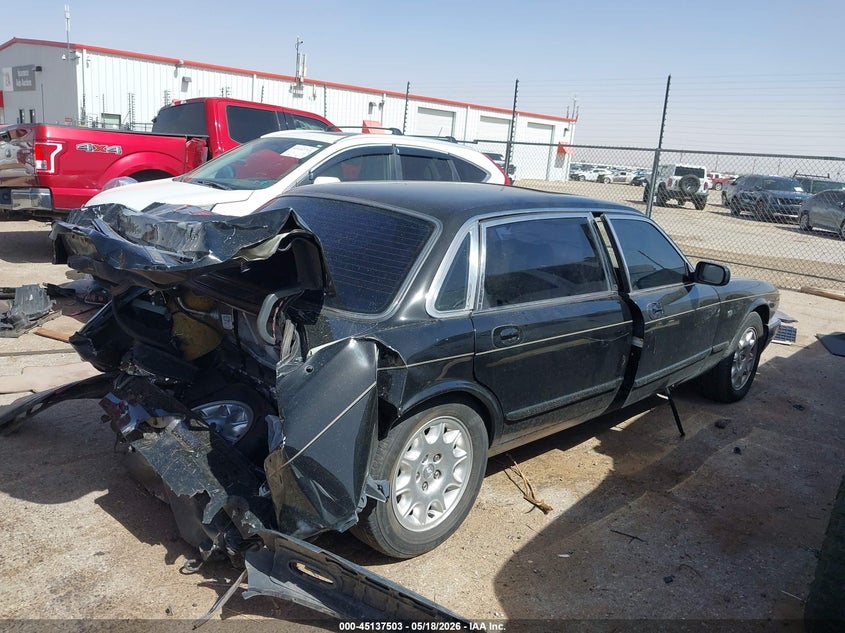 2001 Jaguar Xj series VIN SAJDA23C31LF25364 IAAI salvage auction — REAR END, Salvage (Texas), sold $25 on 2026-07-21 (photo 4)