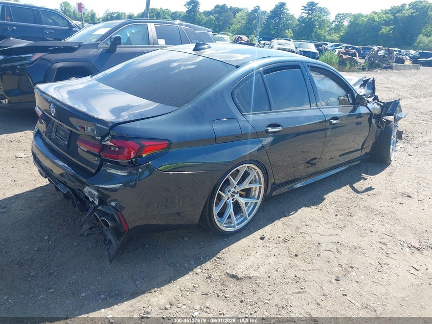 2018 BMW M5 VIN WBSJF0C57JB282016 IAAI salvage auction — FRONT & REAR, Salvage Title, sold $8,300 on 2026-08-25 (photo 4)