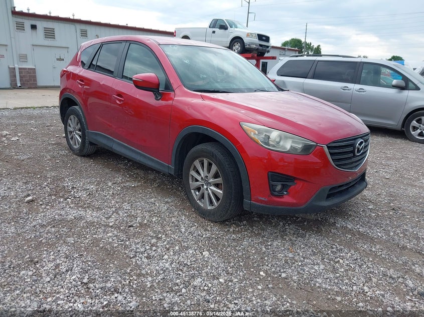 2016 Mazda Cx-5 VIN JM3KE2CY3G0911397 IAAI salvage auction — HAIL, Clear (Missouri), sold $2,250 on 2026-07-06 (photo 1)