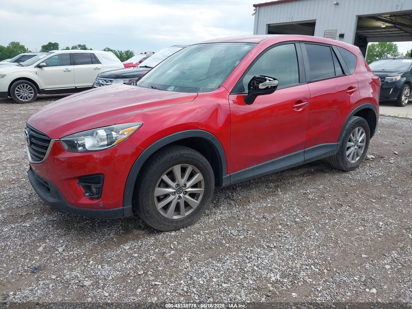2016 Mazda Cx-5 VIN JM3KE2CY3G0911397 IAAI salvage auction — HAIL, Clear (Missouri), sold $2,250 on 2026-07-06 (photo 2)