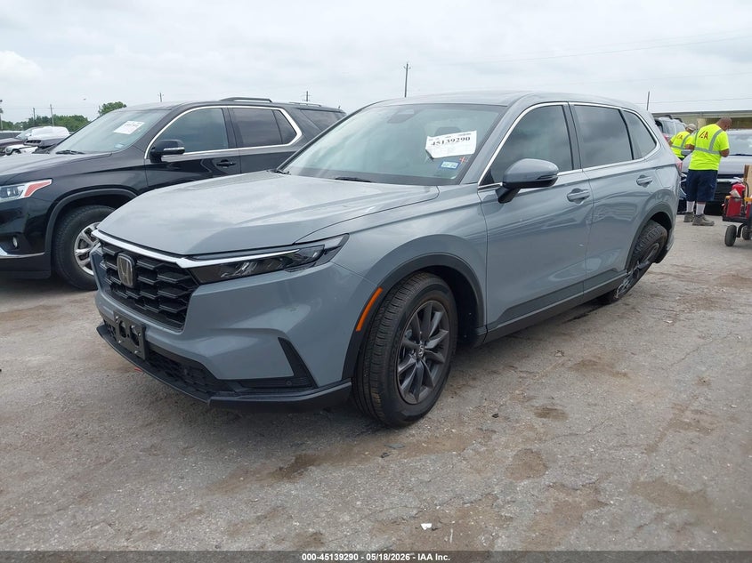 2026 Honda Cr-v VIN 5J6RS3H77TL006749 IAAI salvage auction — SIDE, Salvage (Texas), sold $12,000 on 2026-07-18 (photo 2)