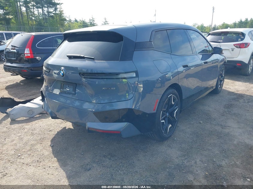 2022 BMW Ix VIN WB523CF05NCK53681 IAAI salvage auction — FRONT & REAR, Salvage (Massachusetts), sold $23,800 on 2026-07-10 (photo 4)