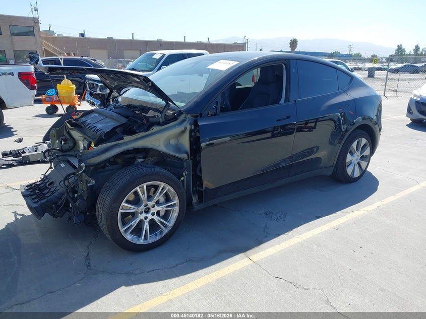 2023 Tesla Model y VIN 7SAYGDEE8PF824143 IAAI salvage auction — FRONT END, Salvage (California), sold $12,900 on 2026-07-10 (photo 2)