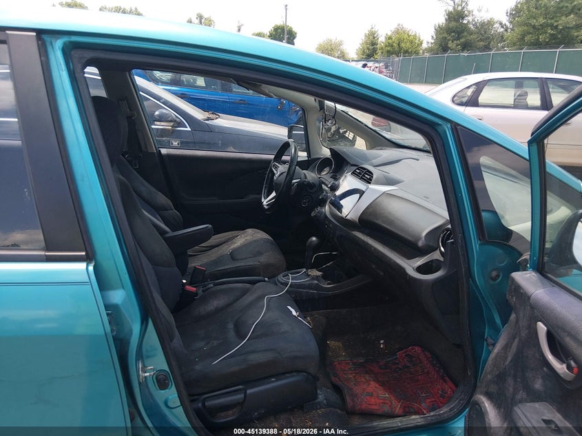 2013 Honda Fit VIN JHMGE8H54DC062437 IAAI salvage auction — NORMAL WEAR, Clear (Florida), sold $225 on 2026-07-27 (photo 5)