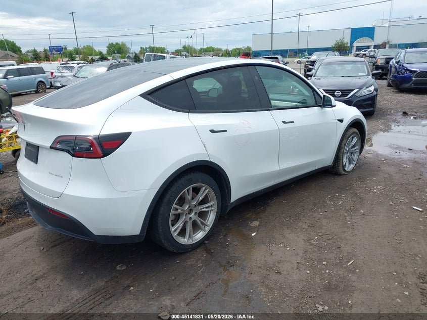 2023 Tesla Model y VIN 7SAYGDEE3PF851170 IAAI salvage auction — LEFT SIDE, Mv-907A (New York), sold $25 on 2026-07-23 (photo 4)