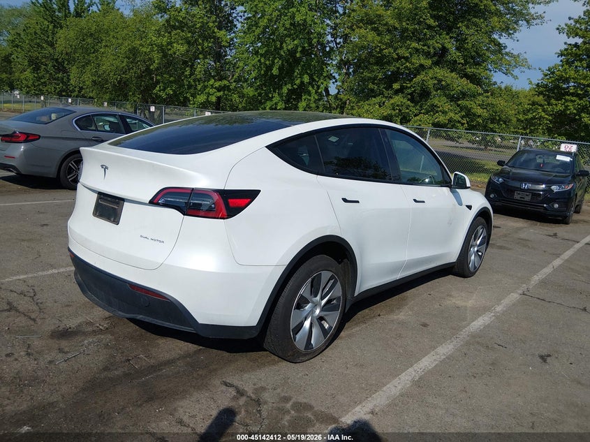 2023 Tesla Model y VIN 7SAYGDEE3PF686365 IAAI salvage auction — LEFT FRONT, Salvage (New Jersey), sold $11,100 on 2026-07-23 (photo 4)