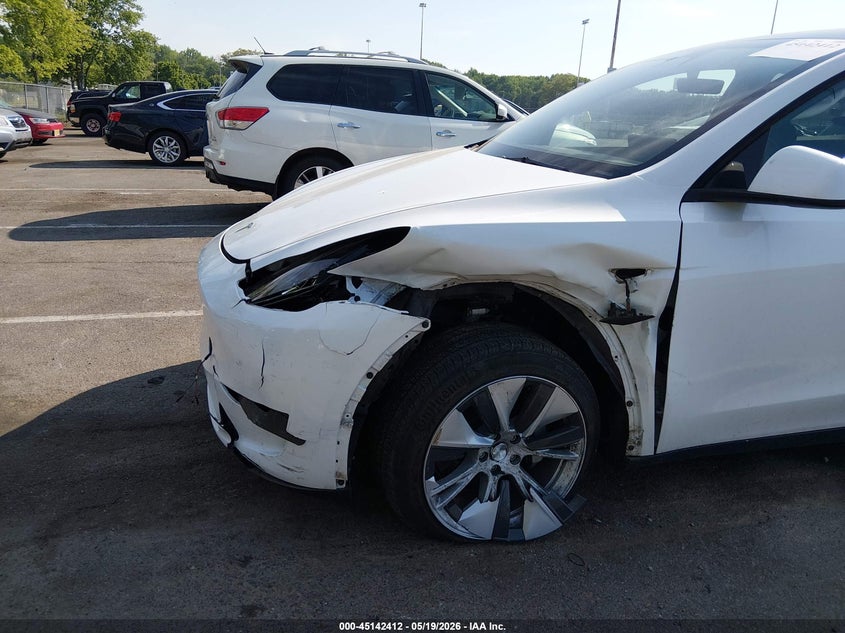 2023 Tesla Model y VIN 7SAYGDEE3PF686365 IAAI salvage auction — LEFT FRONT, Salvage (New Jersey), sold $11,100 on 2026-07-23 (photo 6)