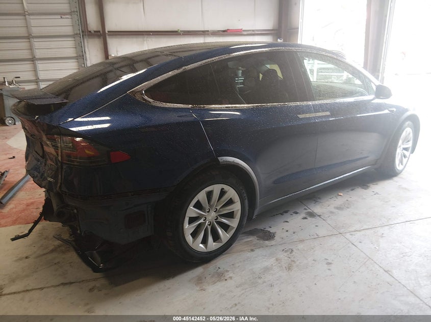2017 Tesla Model x VIN 5YJXCDE28HF057261 IAAI salvage auction — REAR END, Salvage (Virginia), sold $9,100 on 2026-08-20 (photo 4)