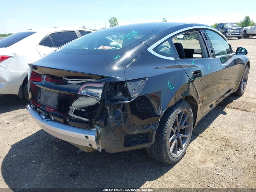 2018 Tesla Model 3 VIN 5YJ3E1EB6JF118880 IAAI salvage auction — REAR END, Clear (Michigan), sold $4,050 on 2026-07-09 (photo 4)