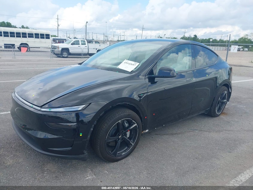 2026 Tesla Model y VIN 7SAYGDED9TF529697 IAAI salvage auction — LEFT & RIGHT, Salvage (Arizona), sold $18,500 on 2026-07-16 (photo 2)
