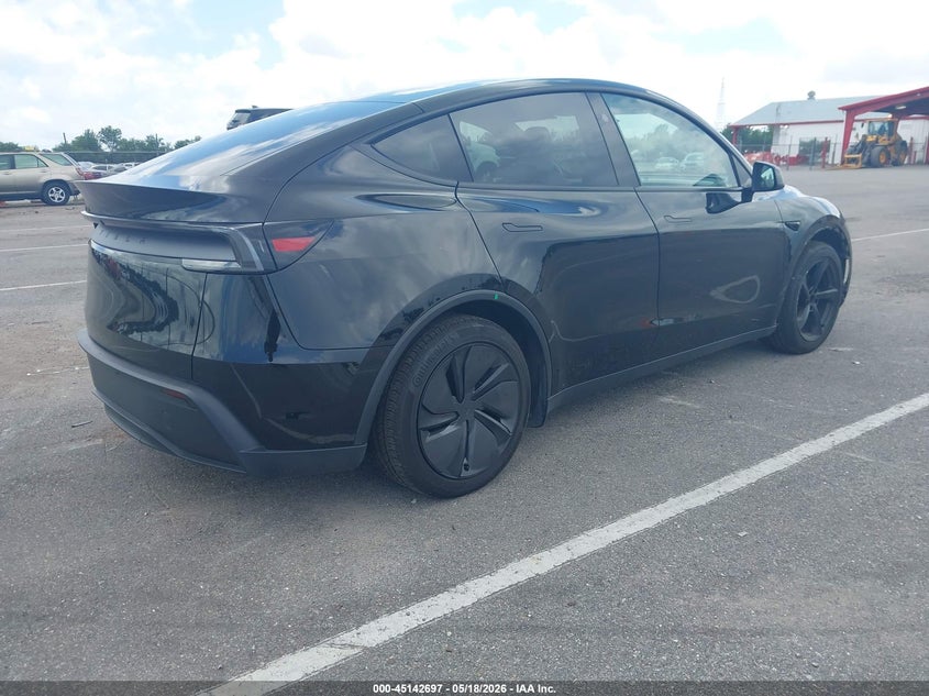 2026 Tesla Model y VIN 7SAYGDED9TF529697 IAAI salvage auction — LEFT & RIGHT, Salvage (Arizona), sold $18,500 on 2026-07-16 (photo 4)