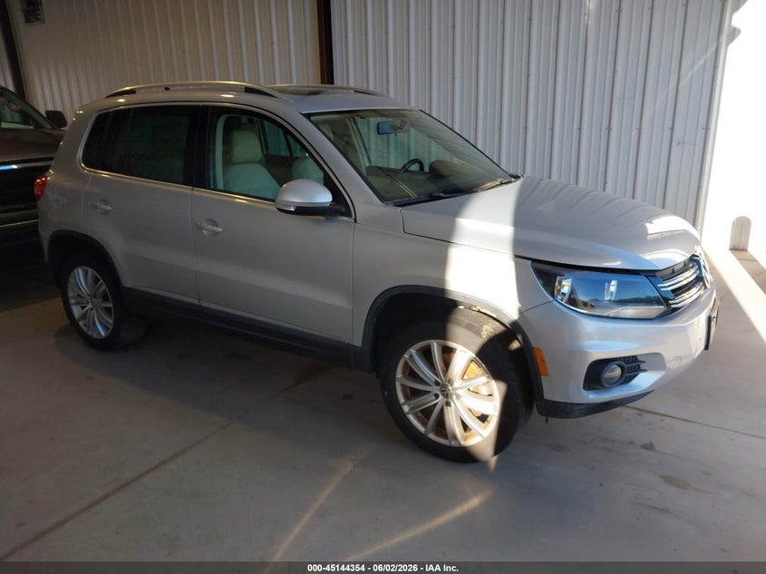 2013 Volkswagen Tiguan VIN WVGAV3AX1DW573118 IAAI salvage auction — NORMAL WEAR, Clear (Delaware), sold $525 on 2026-07-27 (photo 1)