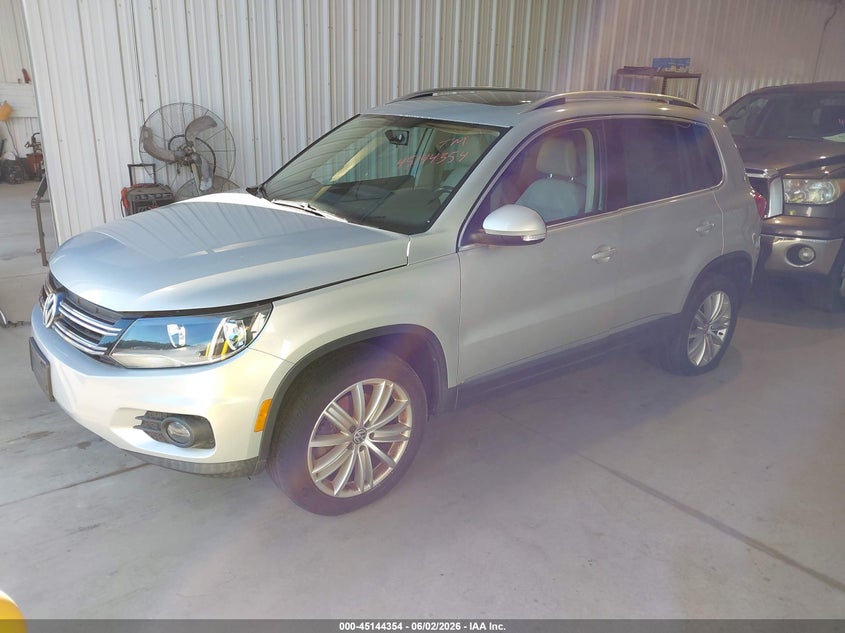 2013 Volkswagen Tiguan VIN WVGAV3AX1DW573118 IAAI salvage auction — NORMAL WEAR, Clear (Delaware), sold $525 on 2026-07-27 (photo 2)