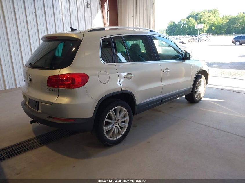 2013 Volkswagen Tiguan VIN WVGAV3AX1DW573118 IAAI salvage auction — NORMAL WEAR, Clear (Delaware), sold $525 on 2026-07-27 (photo 4)