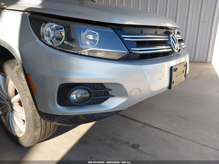 2013 Volkswagen Tiguan VIN WVGAV3AX1DW573118 IAAI salvage auction — NORMAL WEAR, Clear (Delaware), sold $525 on 2026-07-27 (photo 6)