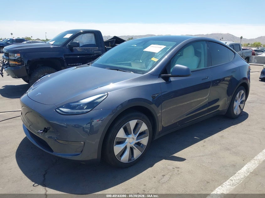 2023 Tesla Model y VIN 7SAYGAEEXPF907586 IAAI salvage auction — RIGHT REAR, Salvage (Arizona), sold $13,000 on 2026-07-14 (photo 2)