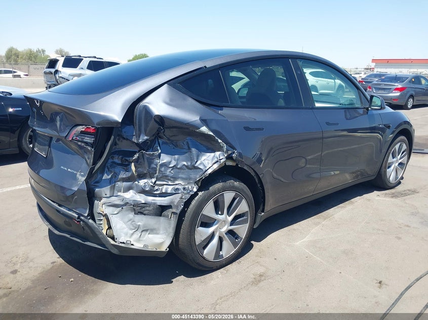 2023 Tesla Model y VIN 7SAYGAEEXPF907586 IAAI salvage auction — RIGHT REAR, Salvage (Arizona), sold $13,000 on 2026-07-14 (photo 4)
