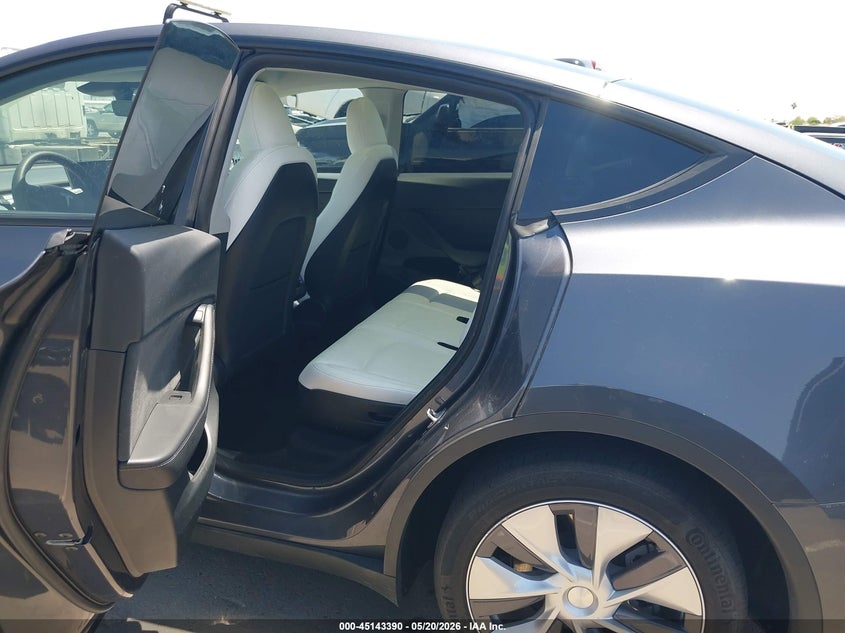 2023 Tesla Model y VIN 7SAYGAEEXPF907586 IAAI salvage auction — RIGHT REAR, Salvage (Arizona), sold $13,000 on 2026-07-14 (photo 8)