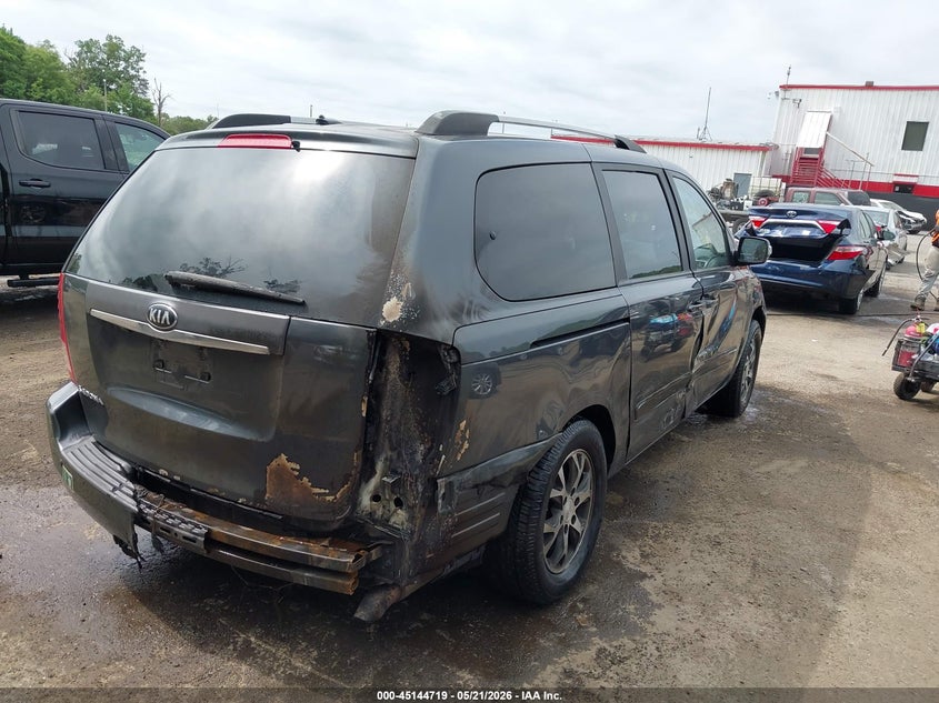2014 Kia SEDONA VIN KNDMG4C76E6548022 IAAI salvage auction — EXTERIOR BURN, Clear (Virginia), sold $1,200 on 2026-07-22 (photo 4)