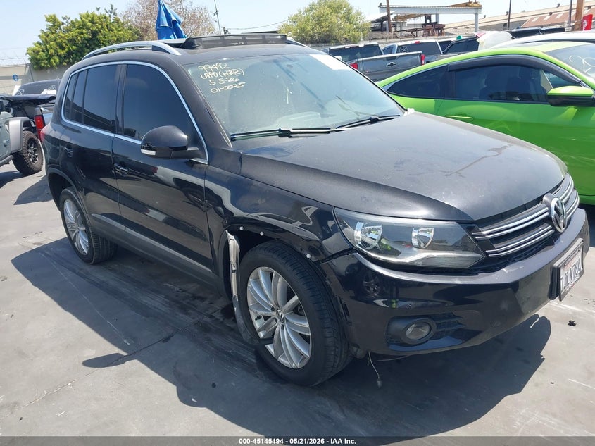 2015 Volkswagen Tiguan VIN WVGAV7AXXFW515969 IAAI salvage auction — LEFT FRONT, Salvage Title, sold $925 on 2026-07-29 (photo 1)