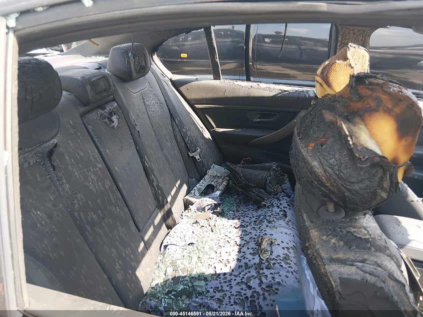 2018 BMW 3er VIN WBA8A3C51JA494581 IAAI salvage auction — TOTAL BURN, Junk Receipt (North Carolina), sold $100 on 2026-07-15 (photo 8)