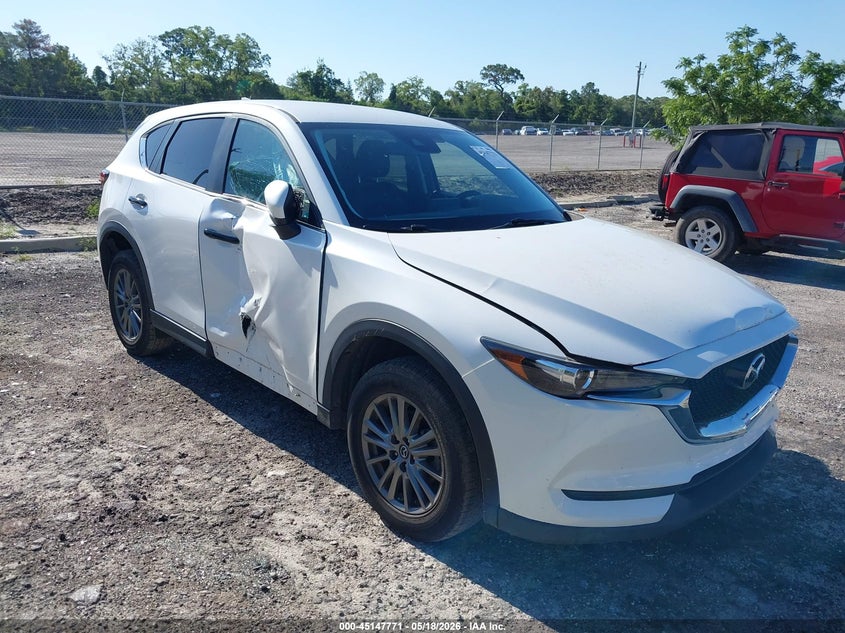 2017 Mazda Cx-5 VIN JM3KFACL3H0123281 IAAI salvage auction — SIDE, Rebuildable (Florida), sold $5,800 on 2026-07-16 (photo 1)