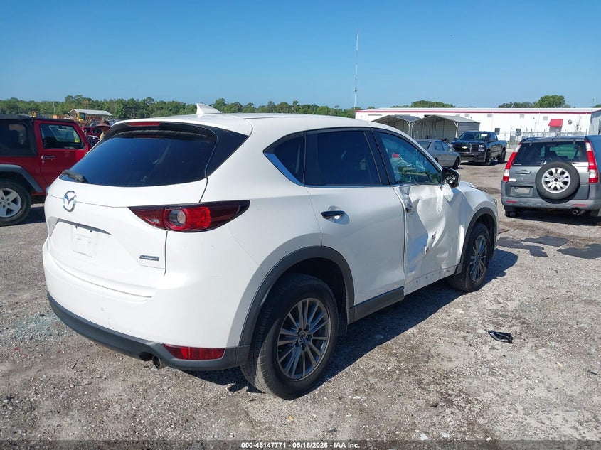 2017 Mazda Cx-5 VIN JM3KFACL3H0123281 IAAI salvage auction — SIDE, Rebuildable (Florida), sold $5,800 on 2026-07-16 (photo 4)