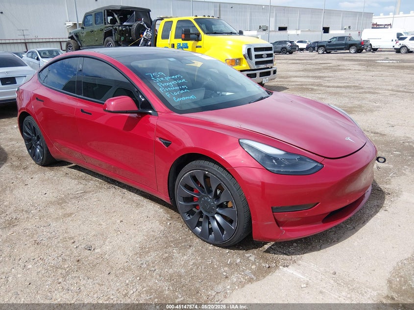 2022 Tesla Model 3 VIN 5YJ3E1EC6NF134320 — IAAI salvage auction photo