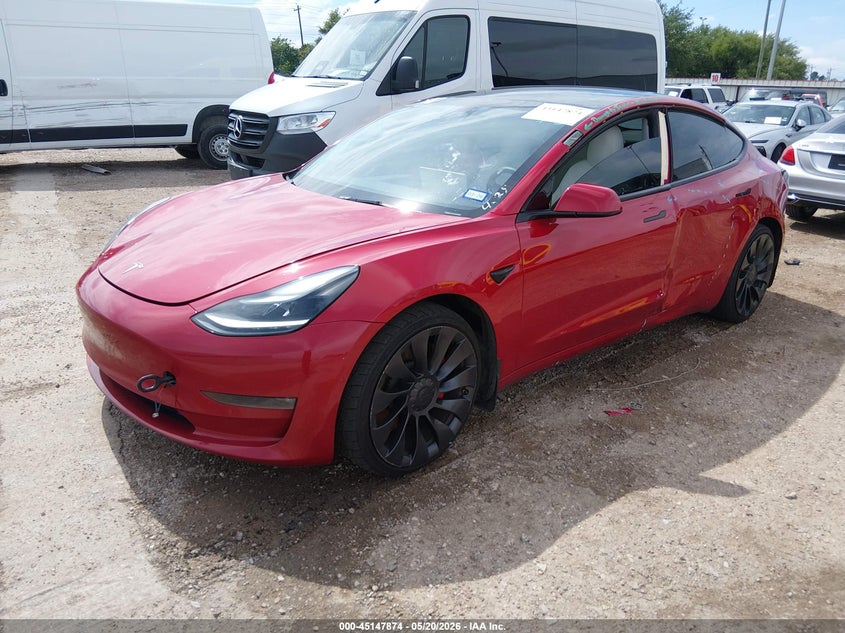 2022 Tesla Model 3 VIN 5YJ3E1EC6NF134320 IAAI salvage auction — LEFT SIDE, Original (Texas), sold $10,500 on 2026-09-11 (photo 2)