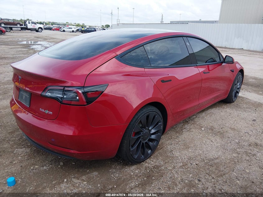 2022 Tesla Model 3 VIN 5YJ3E1EC6NF134320 IAAI salvage auction — LEFT SIDE, Original (Texas), sold $10,500 on 2026-09-11 (photo 4)