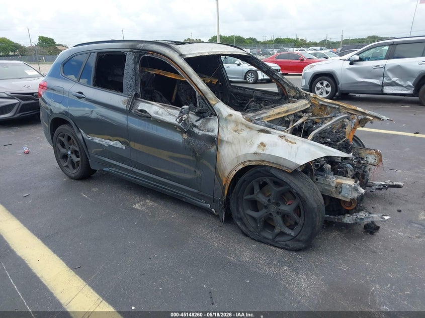 2019 BMW X1 VIN WBXHU7C5XK5L12259 IAAI salvage auction — BURN, Certificate Of Destruction (Florida), sold $200 on 2026-07-23 (photo 1)