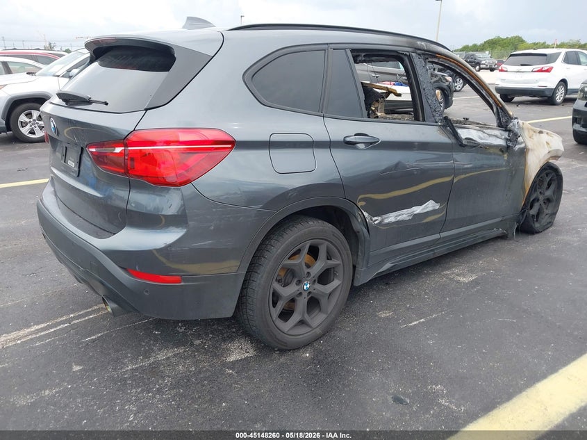2019 BMW X1 VIN WBXHU7C5XK5L12259 IAAI salvage auction — BURN, Certificate Of Destruction (Florida), sold $200 on 2026-07-23 (photo 4)